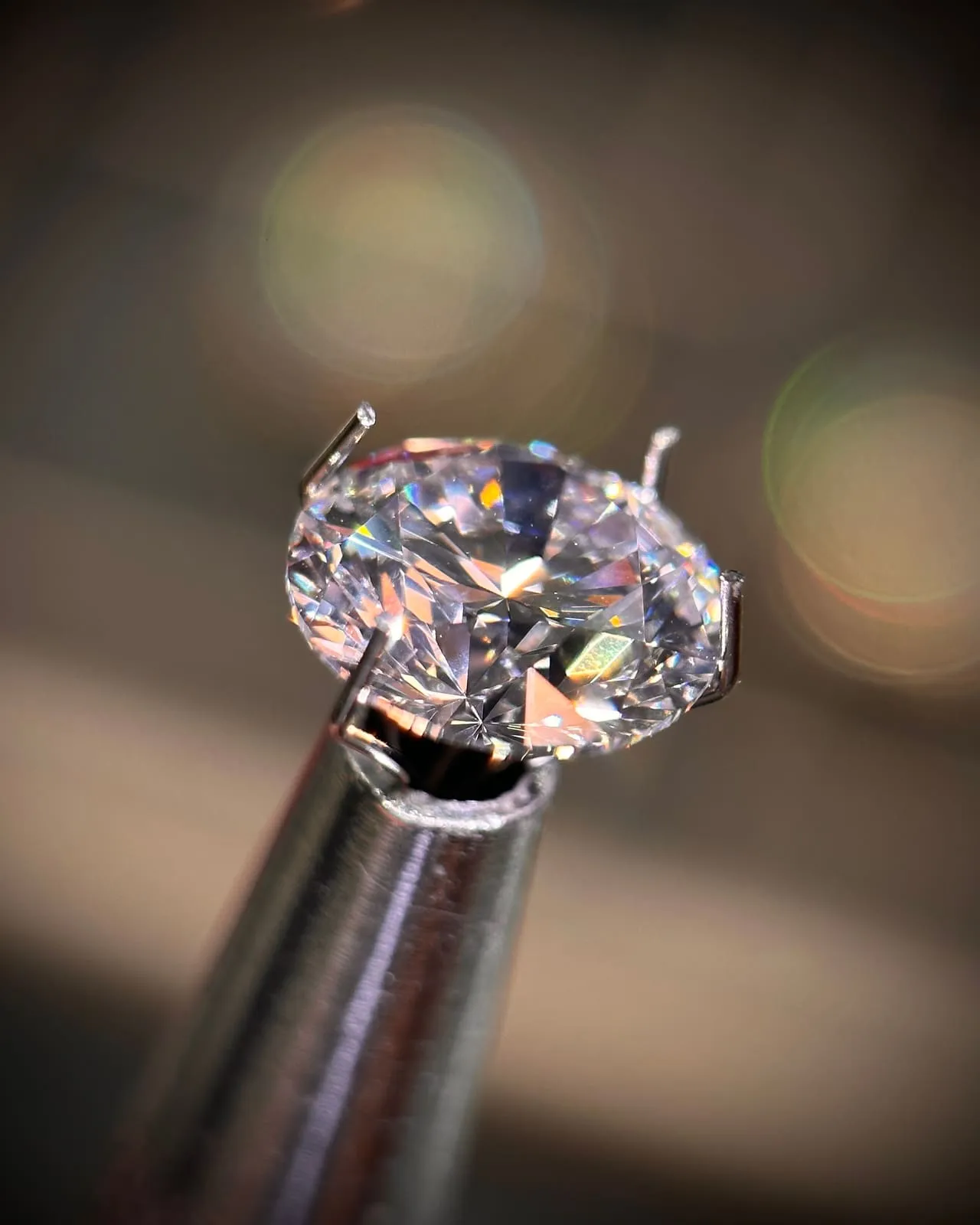 Close-up of a gemstone held in its prongs